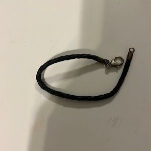 Leather bracelet.